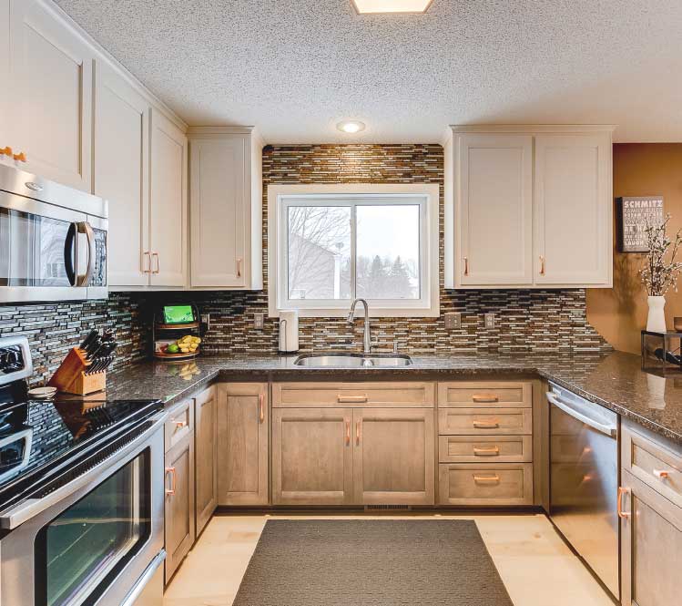 white upper brown lower cabinets