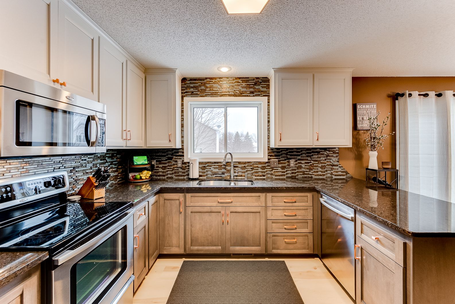 white upper brown lower cabinets