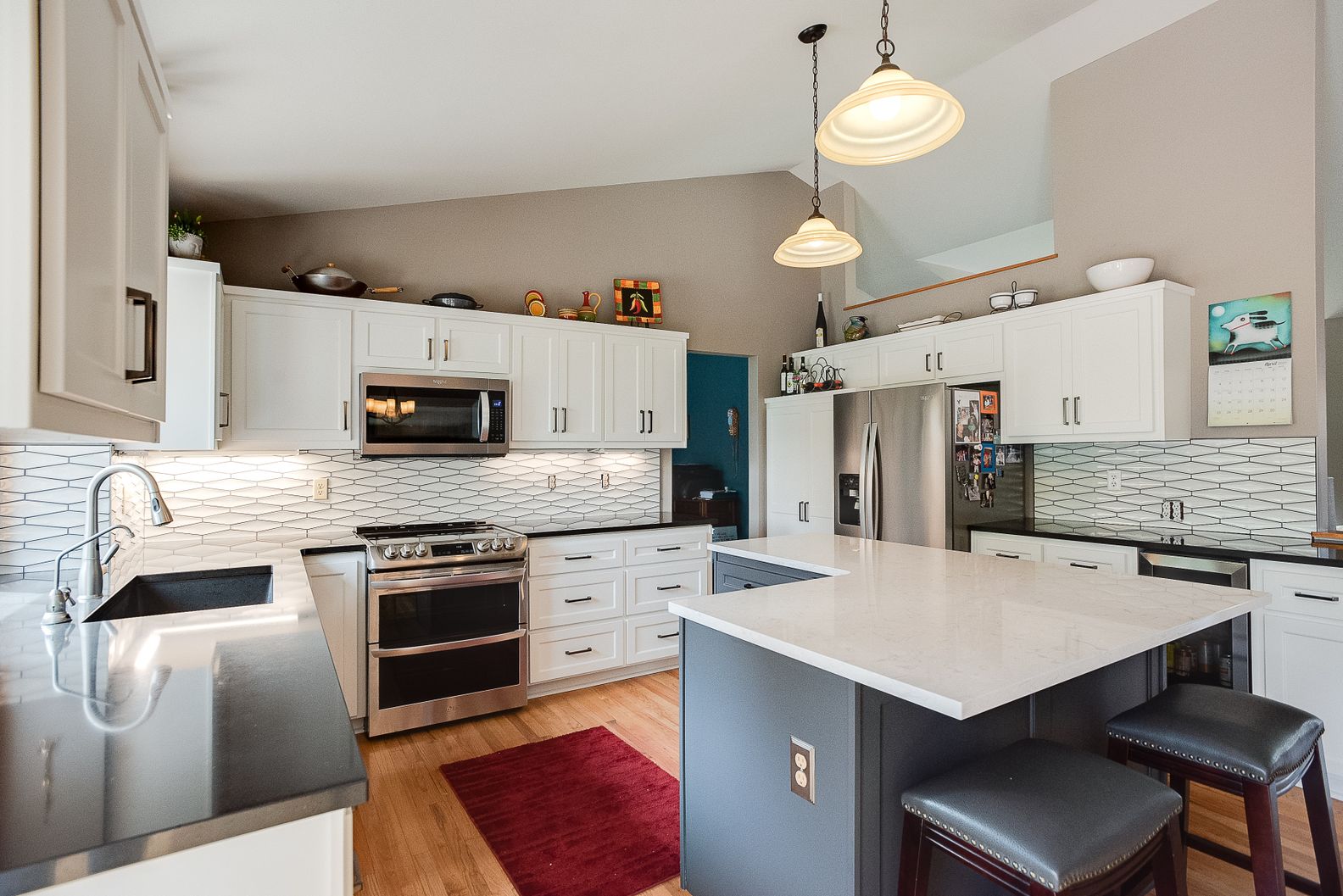 white upper brown lower cabinets